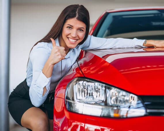 Customers loading luggage into a self-drive rental car